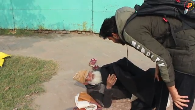 Hands holding a donation jar