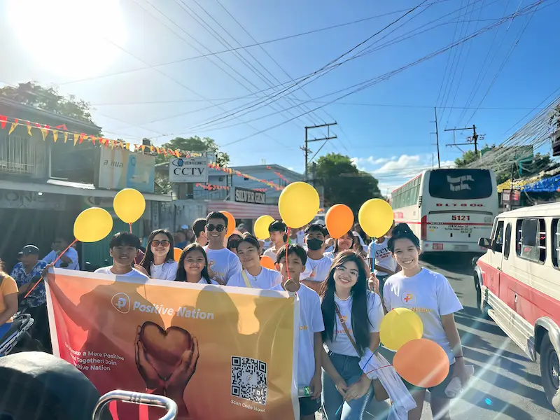 Volunteers packing food at a community food drive