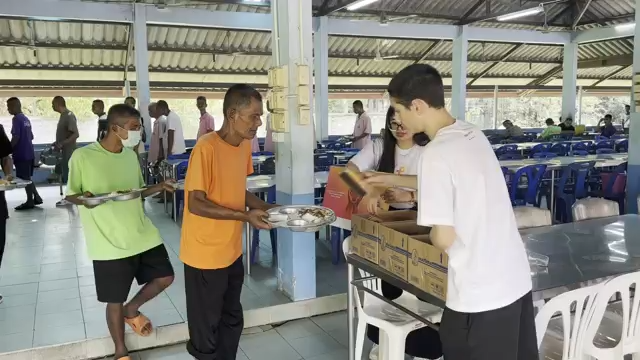 Volunteers serving food